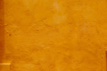 Textured Orange Plaster and Stone Wall in Cartagena, Colombia Old City