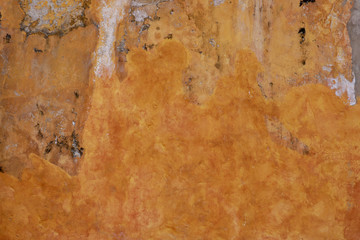 Textured Orange/Yellow Plastered Stone Wall