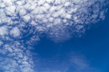 White clouds on the left and blue space on the right to enter the text.