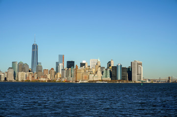 Fototapeta na wymiar New York city skyline view from the boat to Ellis Island