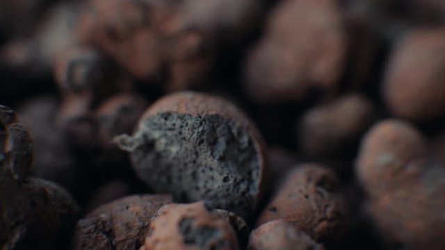 Expanded Clay Aggregate - Grow rocks (Growing medium). Close-up with Shallow Depth of Field. Isolated on white background.