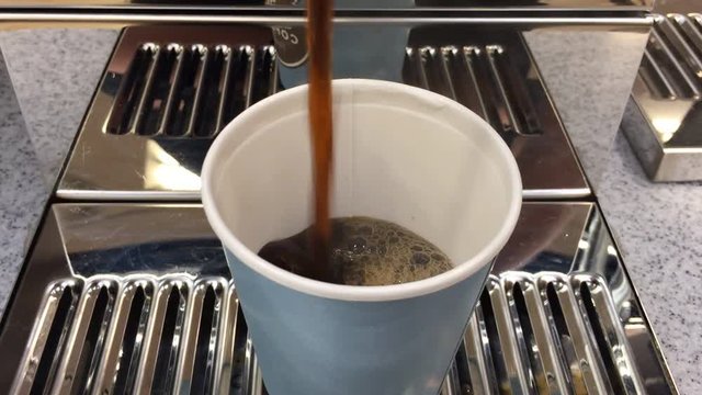 pouring black coffee