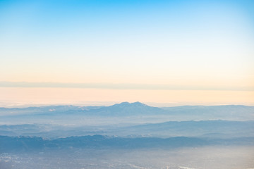 Fototapeta na wymiar Lone Mountain - layered photo with fog - next steps - horizonCalifornia USA