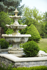 Splashing fountain in garden