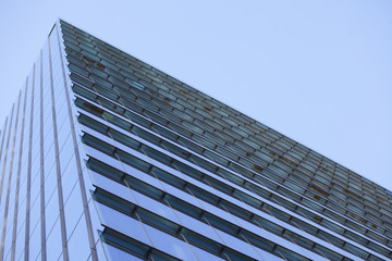 Fototapeta na wymiar abstract glass windows of skyscraper building
