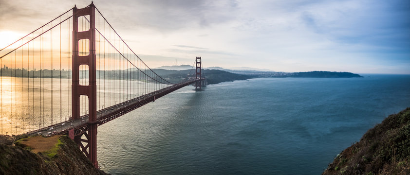Sunrise looking at the Golden Gate Bridge - good morning - yellow to blue sky