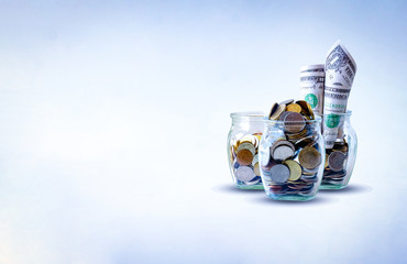 The coins in bottle on white background. save money for future. The concept of growth for the save money.