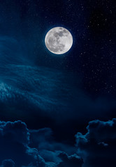 Naklejka na ściany i meble Landscape of night sky and bright full moon with many stars.