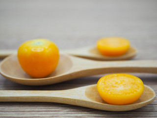 Fresh cape goosebery, physalis, on wooden background