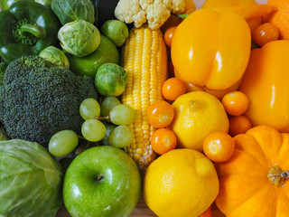 Colorful fresh fruits and vegetables background, healthy eating concept.