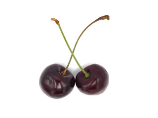 Fresh sweet cherry in shopping cart or trolly isolated on white background.