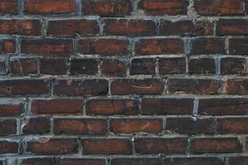Old and Worn Exterior Brick Wall