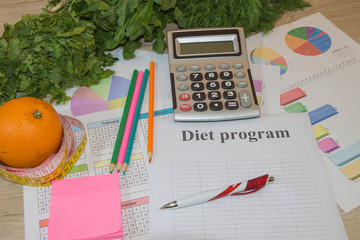 Healthy nutrition in the foreground. Low-calorie fruit and vegetables diet. Weight control concept