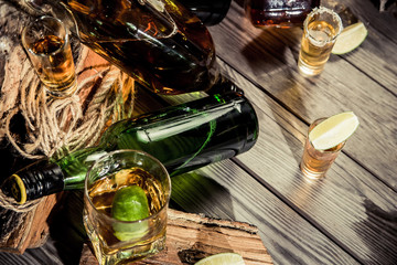 Alcohol in an old bar on a pirate ship with vintage rum and whiskey