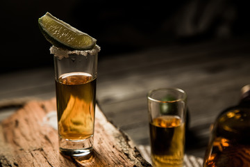 Elite tequila in a pile with lime