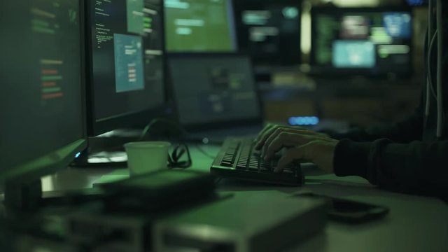 Black hat hacker stealing data and hacking networks