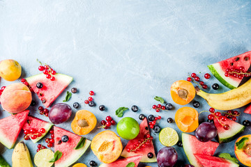 Summer vitamin food concept, various fruit and berries watermelon peach mint plum apricots...