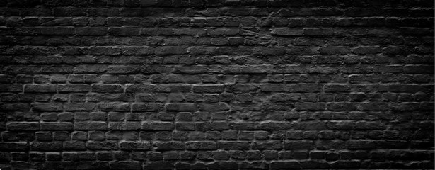 Fototapeta na wymiar Black brick wall panoramic background