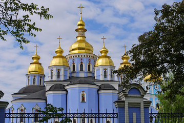 Fototapeta na wymiar View from afar to the beautiful St. Michael's Golden-Domed Monastery. Kiev, Ukraine