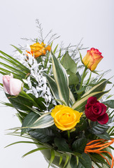 Bouquet of assorted multicolored roses isolated on white background