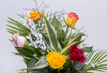 Bouquet of assorted multicolored roses isolated on white background