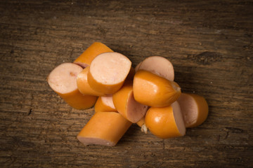 sausage slice on old wood