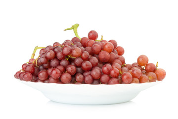 grapes seedless red on dish isolated on white background