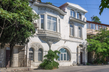 Russia, the Republic of Crimea, the city of Alupka. 06/09/2018: Facade of the old house, city street