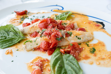 Cod with tomato and basil