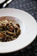 Spaghetti truffle cream sauce with mushroom