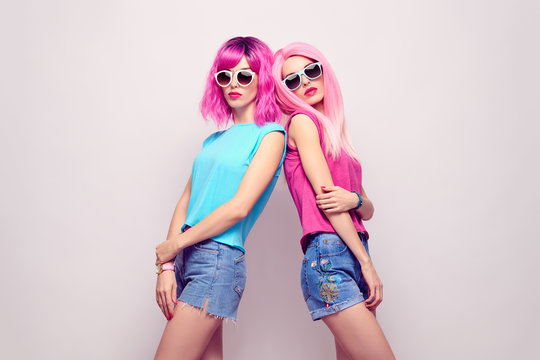 Two Hipster Girl, Pink Fashion Hairstyle in Studio
