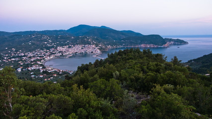 Fototapeta na wymiar Aerial view of Skopelos harbour and town before sunrise, island of Skopelos, Greece