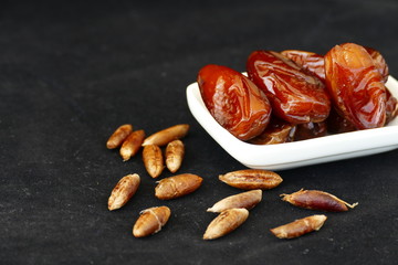 dates and dates kernel on a black background,

