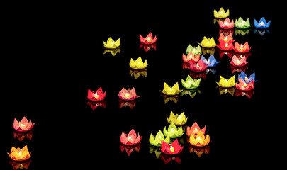 Floating lantern shines on the river at night during the festival of the birth of Buddha. This is the traditional ritual of the Vietnamese people for peace in life