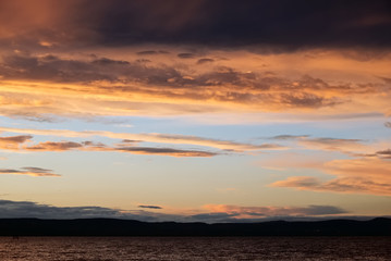 Naklejka na ściany i meble sunset over lake - painted sky golden shine feathers of angels - Balaton lake, late sunset, dark tones