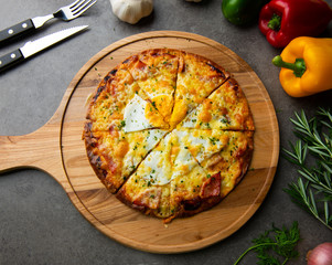 Pizza with egg ham and mushrooms