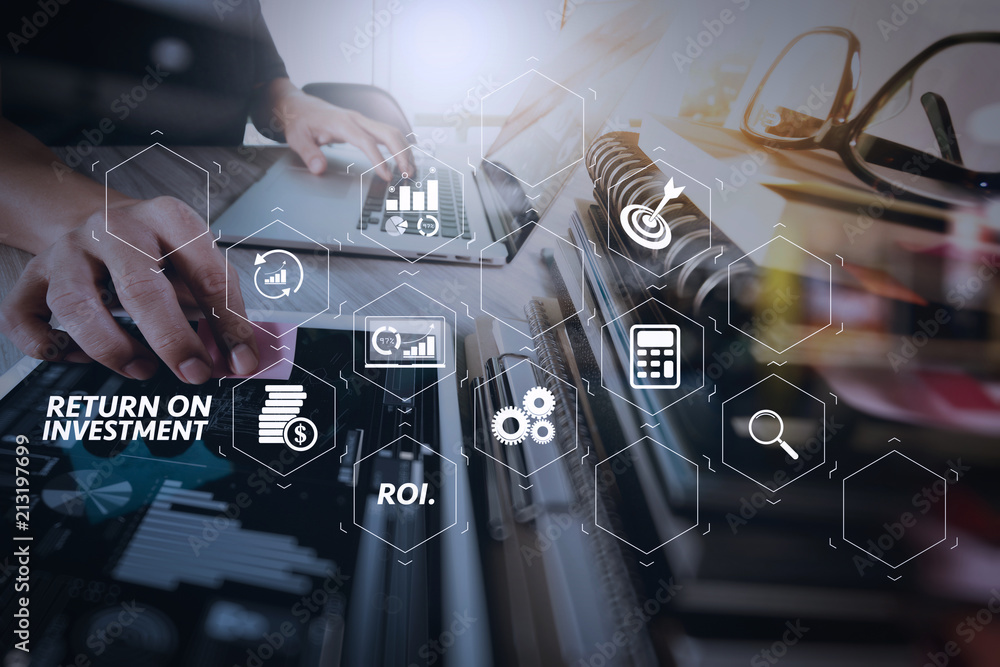 Poster business documents on office table with smart phone and digital tablet and graph business with social network diagram and man working in the background