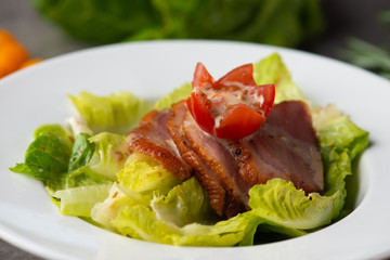 smoked duck salad on table