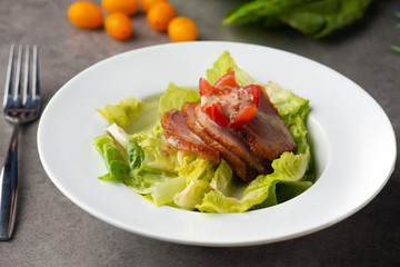 smoked duck salad on table