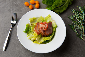 smoked duck salad on table