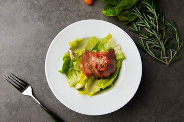 smoked duck salad on table