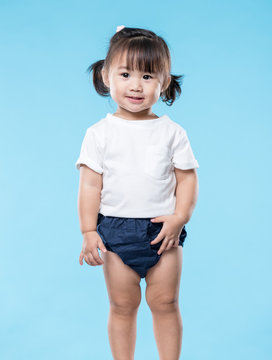 Lovely asian Baby girl over blue background