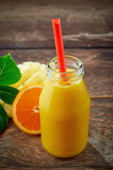 Healthy fresh orange and mango smoothie