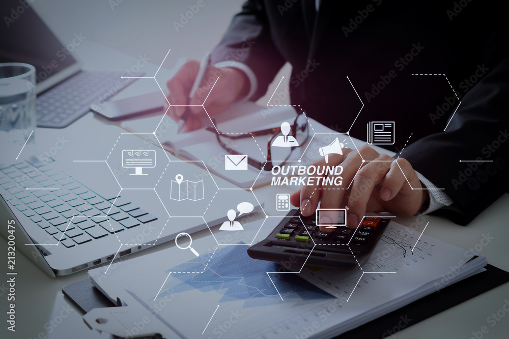 Aufkleber businessman hand working with finances about cost and calculator and latop with mobile phone on with