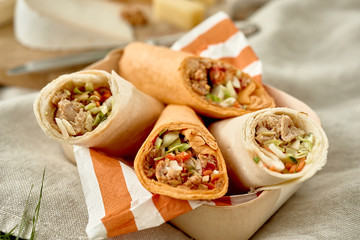 Tasty doner kebabs or wraps at a summer picnic