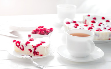 Panna cotta raspberries on a wooden table
