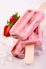 Three fresh fruit strawberry popsicles