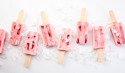 Panorama banner with fresh strawberry popsicles
