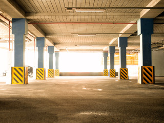 Empty underground parking background with copy space. Economy Of Land Resourses Concept