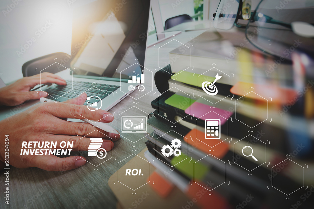 Poster business documents on office table with smart phone and digital tablet and graph business with social network diagram and man working in the background